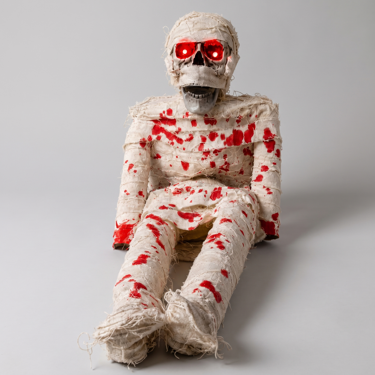 The Wrapped Dead sitting up with glowing red eyes
