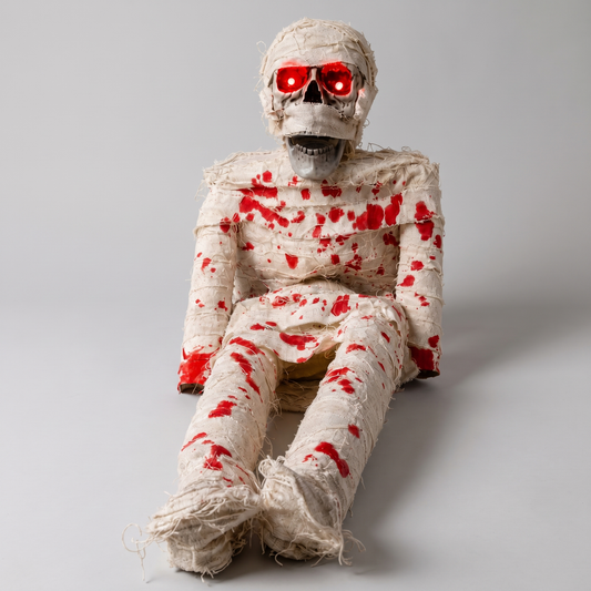 The Wrapped Dead sitting up with glowing red eyes